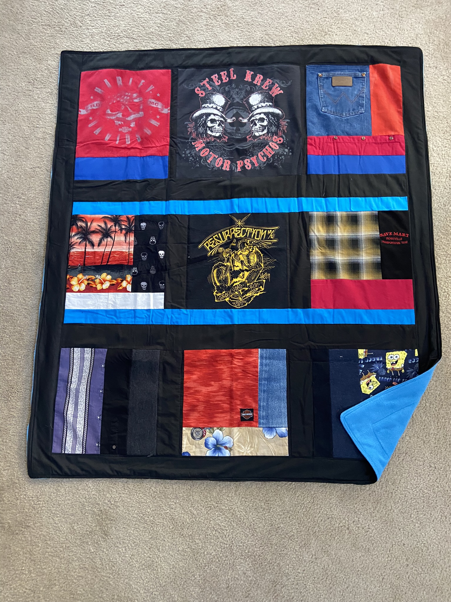 Black Quilt with blue backing.